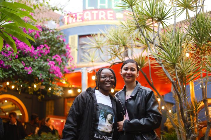 A young adult who participated in the research project and the documentary, alongside a Mamelani staff member.