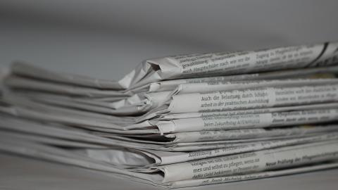 Photo of stack of newspapers