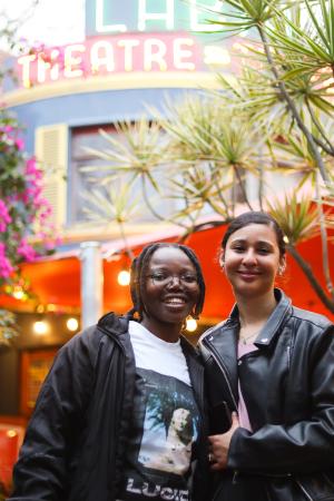 A young adult who participated in the research project and the documentary, alongside a Mamelani staff member.
